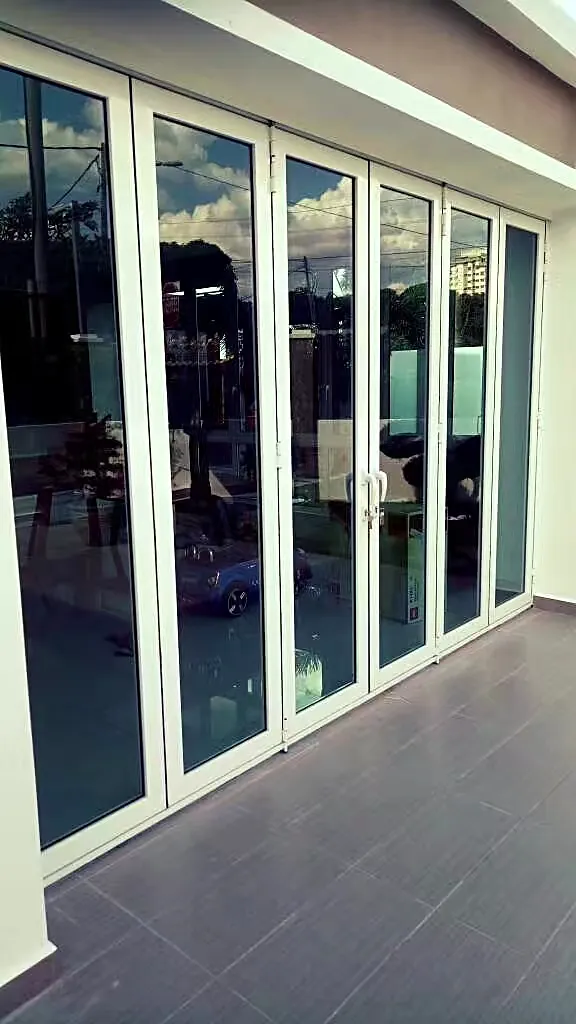 Folding glass doors along a terrace